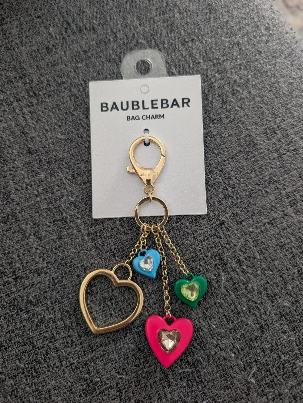 BaubleBar Gold Heart Bag Charm with Pink, Blue, and Green Hearts